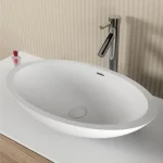 Alacsony ár Riho Avella Solid Surface pultra ültethető ovális mosdó, csaplyuk nélkül, 58x36x10cm, Matt Fehér W016003105